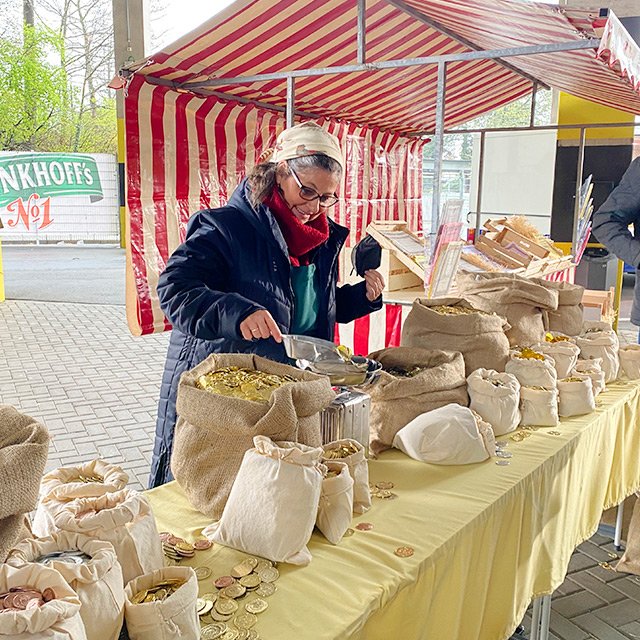 Frau auf dem Wochenmarkt
